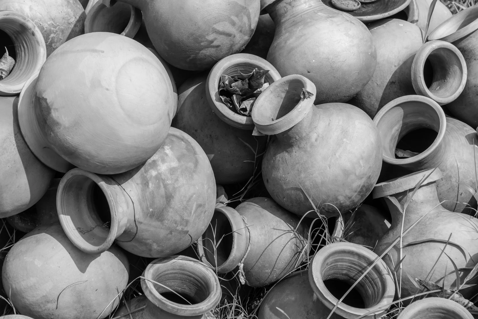 Handmade clay vessels; illustrative pottery photograph, not the tour workshop