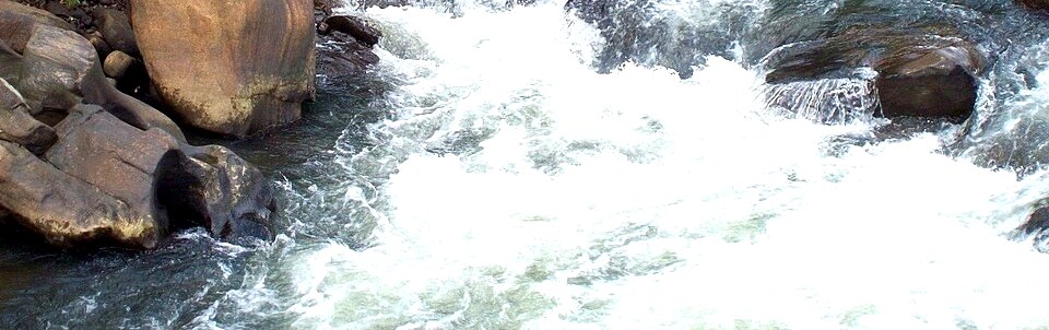 Kelani River rapids and rocks at Kitulgala